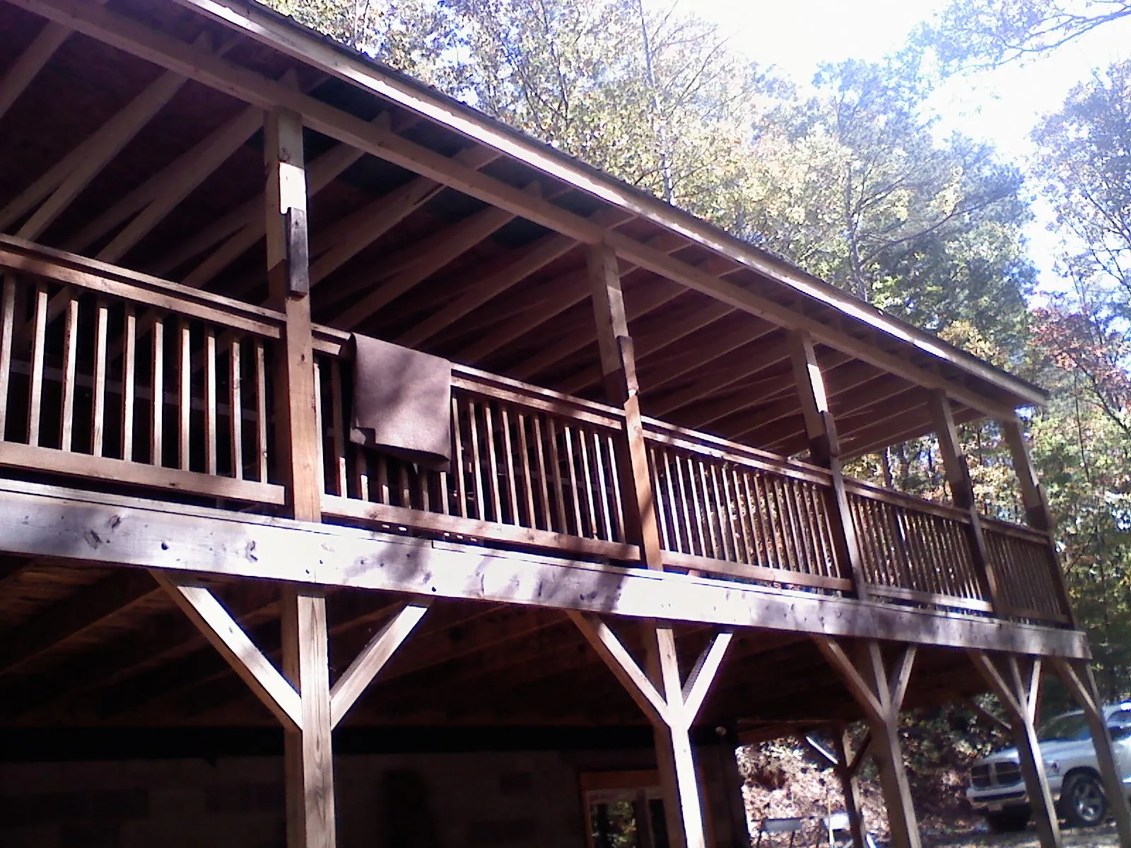 Timber framing under a new elevated porch and deck — Roof Leak Repair in Kathryn by Roofing Brothers